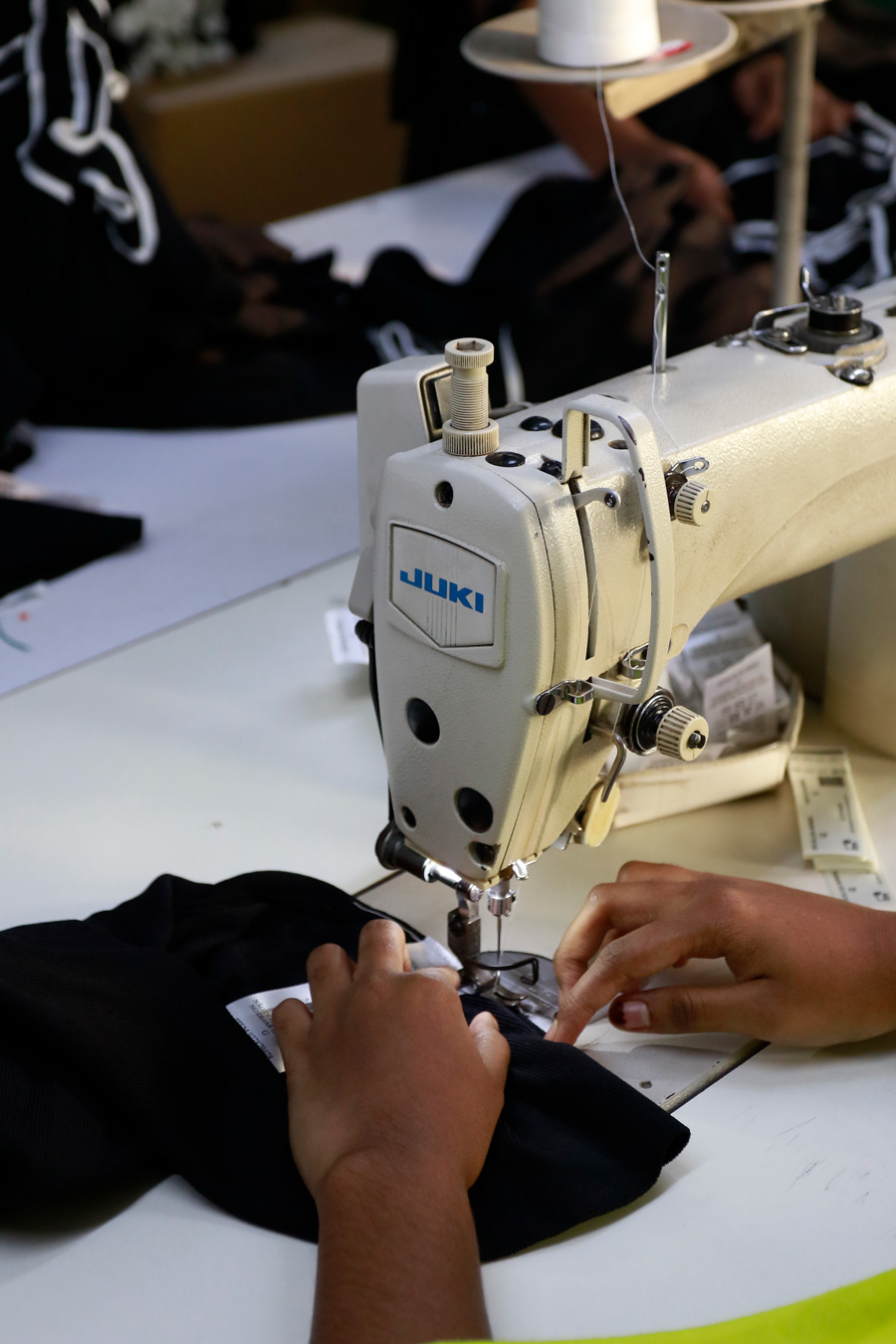 Factory worker operating machinery in a manufacturing facility